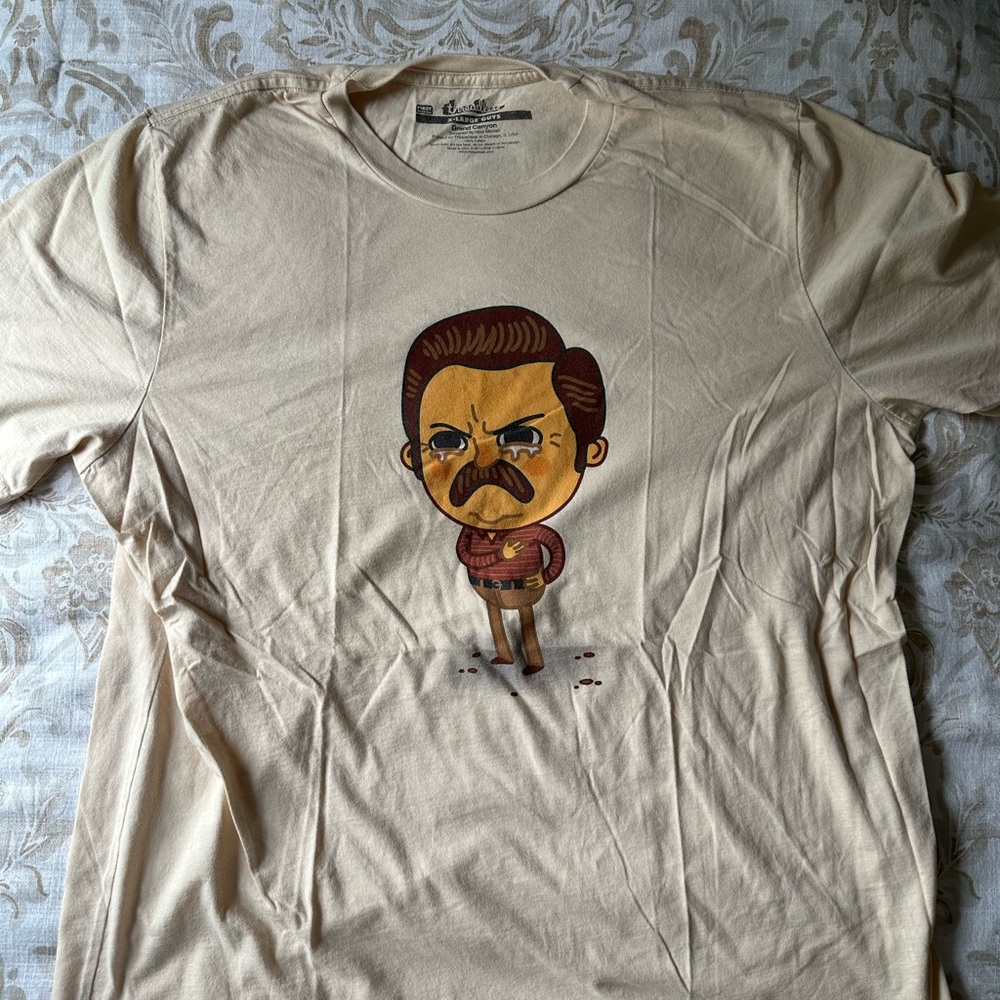 Threadless design 2012 “Grand Canyon “.  Color Cream, size XL.